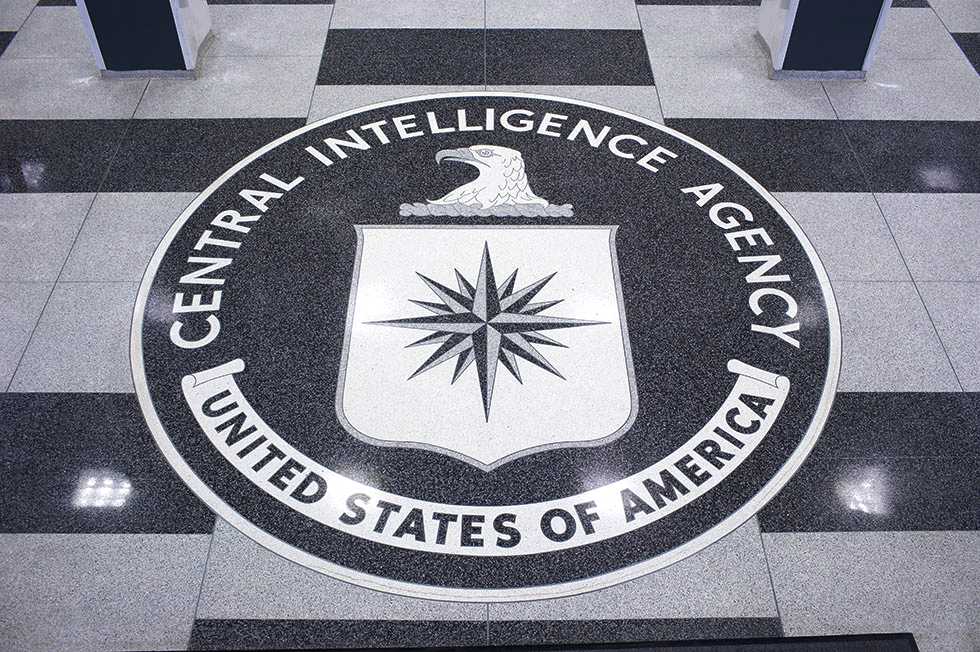 A large black, white, and gray granite version of the CIA seal.
