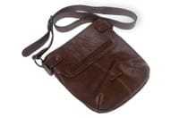 A brown leather purse with a strap folded.