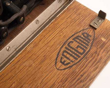 A close-up of the logo on the ENIGMA machine.