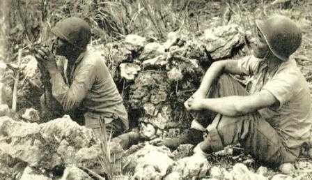 Jack Nez with another man in the field.