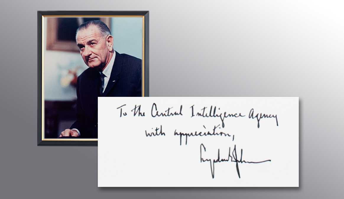 A picture of President Johnson and a handwritten note from him thanking the CIA for their services.