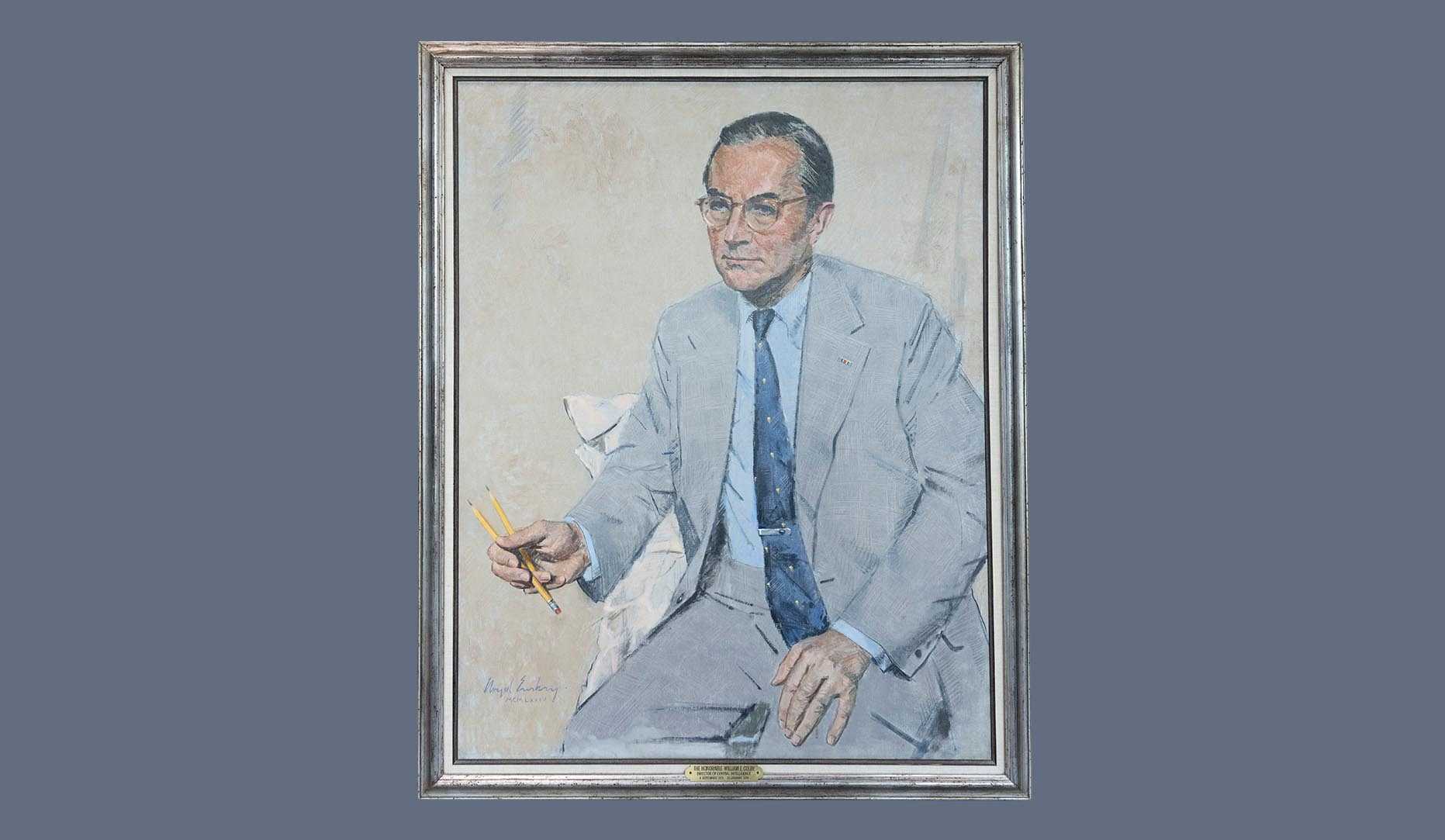 A portrait of former CIA director William E. Colby in a gold frame.