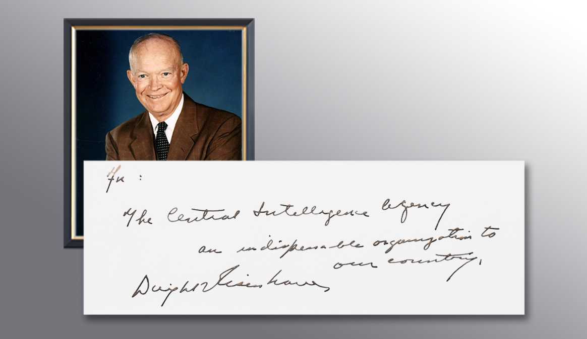 A picture of President Eisenhower and a handwritten note from him thanking the CIA for their services.