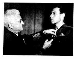 Peter Ortiz recieving a medal.