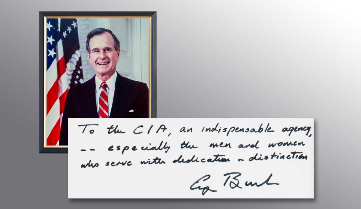 A picture of President George H.W. Bush and a handwritten note from him thanking the CIA for their services.