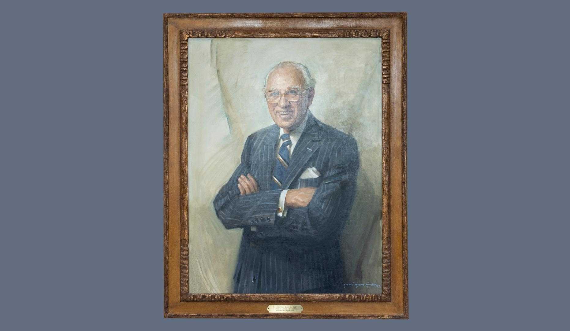 A portrait of former CIA director William J. Casey in a gold frame.