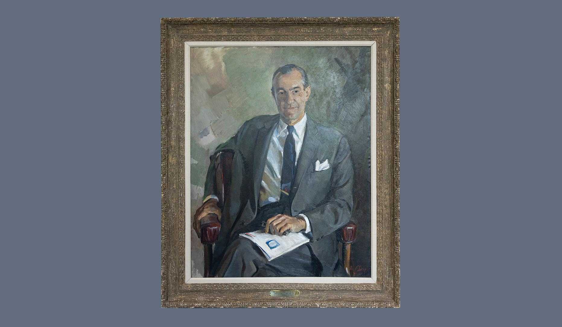 A portrait of former CIA director Richard M. Helms in a gold frame.