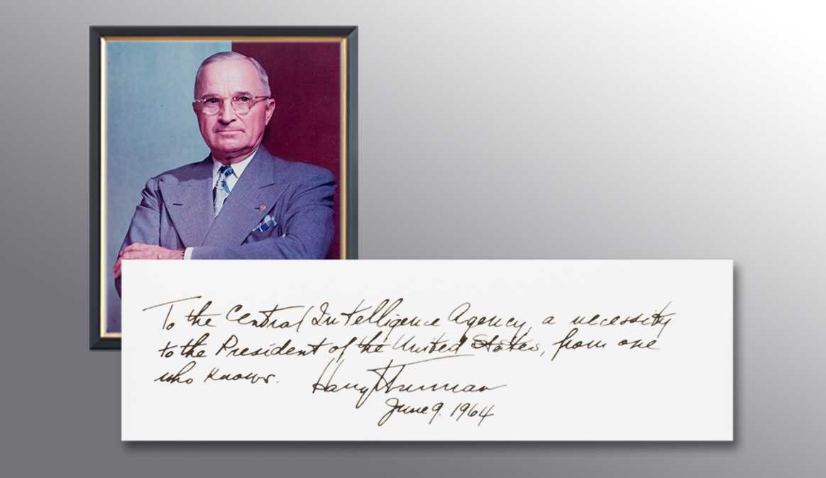 A picture of President Truman and a handwritten note from him thanking the CIA for their services.
