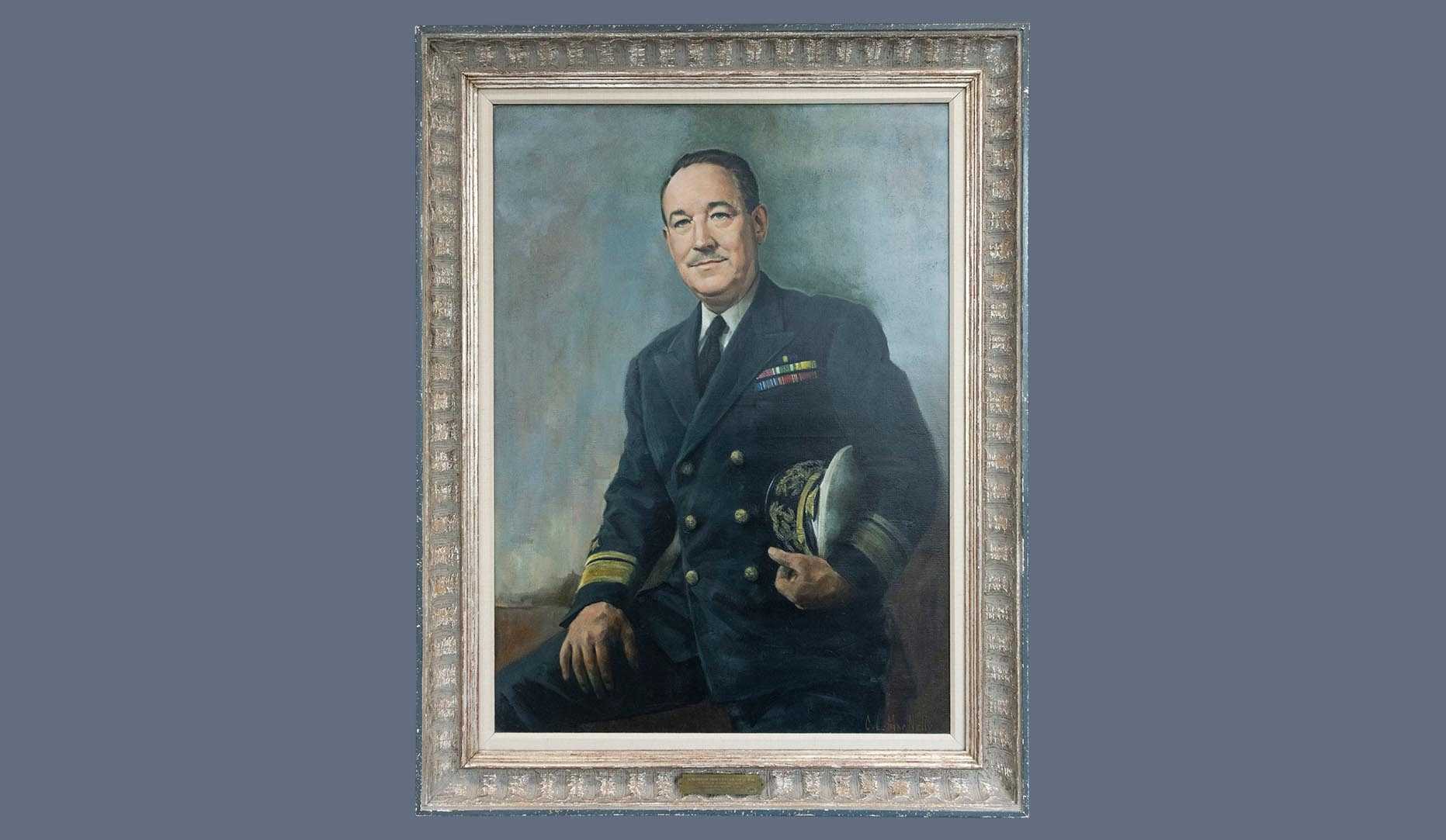 A portrait of former CIA director Sidney W. Souers in a gold frame.