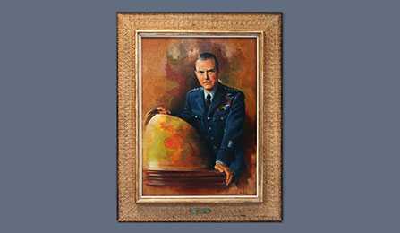 A portrait of former CIA director Hoyt. S. Vandenberg in a gold frame.