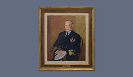 A portrait of former CIA director Roscoe H. Hillenkoetter in a gold frame.