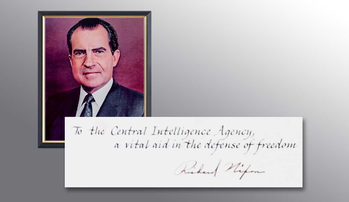 A picture of President Nixon and a handwritten note from him thanking the CIA for their services.
