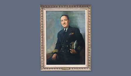 A portrait of former CIA director Sidney W. Souers in a gold frame.