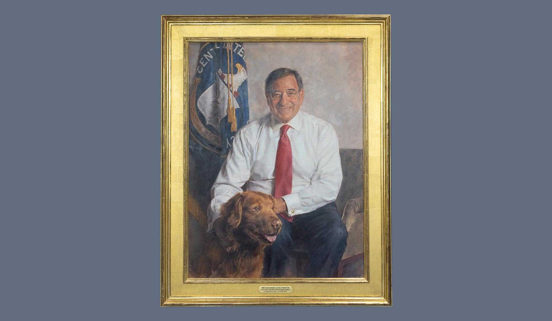 A portrait of former CIA director Leon E. Panetta in a gold frame.