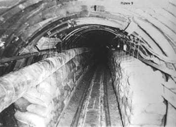 Black and white photo down the Berlin Tunnel.