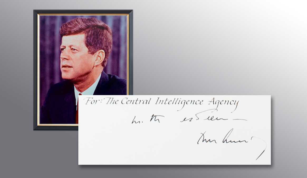 A picture of President J.F. Kennedy and a handwritten note from him thanking the CIA for their services.