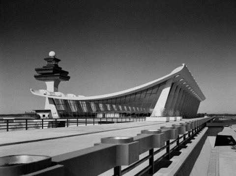 black and white photo of building and road (Dulles Airport)