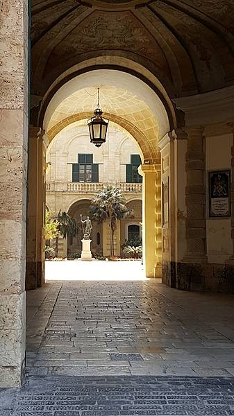 A view of the statue of Neptune in the Presidential Palace courtyard in the center of Malta's capital city, Valletta. The Palace is the official office of the president of the Republic of Malta and has been the seat of authority in Malta since the 16th century, when it was known as the Magistral Palace. The site was among the first to be built in the new city of Valletta with construction occurring between 1566 and 1571. Under the British it served as the Governor's Palace. The House of Representatives used to be housed there until relocated to a new Parliament House at the entrance to Valletta.