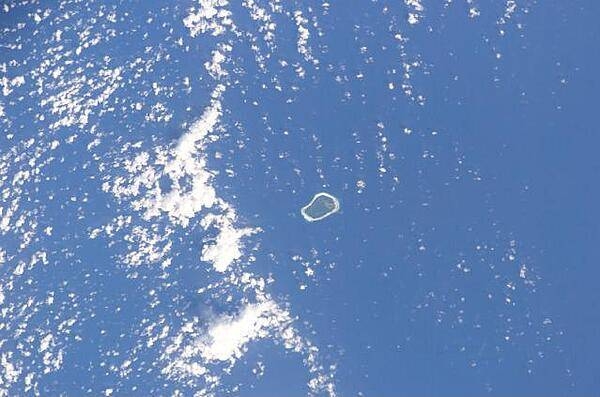 The coral reef that makes up Clipperton Island forms a complete ring. Image courtesy of NASA.