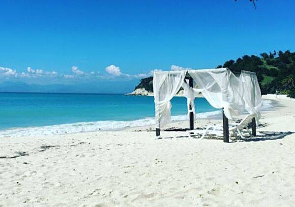Ile-à-Vache (Cow Island) is an island commune in the Les Cayes (Baie de Cayes) about 10 km (6 mi) off the coast of Haiti’s southwest peninsula. The island is about 13 km (8 mi) long and 3.2 km (2 mi) wide, with an area of 52 sq km (20 sq mi). The western end of the island has rolling hills and swamps; the eastern side of the island has a lagoon with a large mangrove forests. The island is surrounded by several dangerous shoals, reefs, and rocks that have been the cause of shipwrecks throughout history. The government has plans to develop this area’s tourism in a sustainable manner.