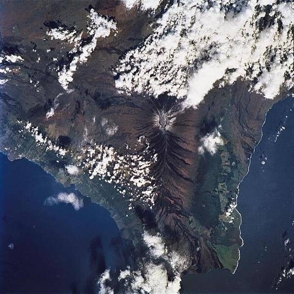 A view of the island of Hawaii (the Big Island) in the Hawaiian Islands as seen from the International Space Station. The famous volcanic mountain Mauna Loa is visible at frame center. Image courtesy of NASA.