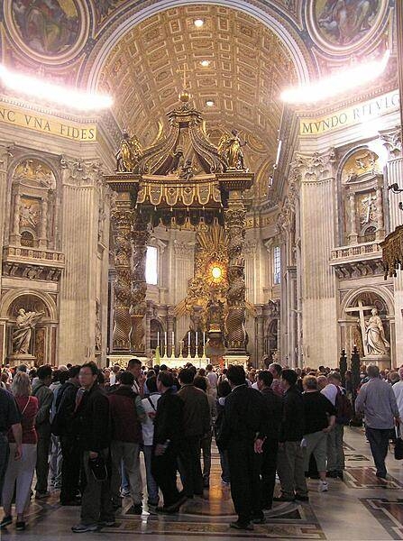 The baldachin is a massive pavilion-like structure (30 m; 98 ft tall) that stands beneath the dome of St. Peter&apos;s Basilica and over the high altar. It is reputed to be the largest piece of bronze in the world.