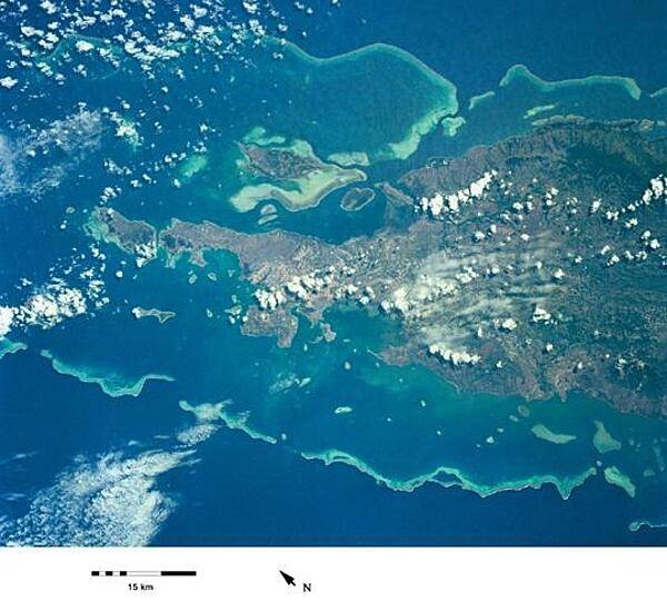 View of the northern portion of New Caledonia. The world&apos;s second largest barrier reef encircles the island. Image courtesy of NASA.