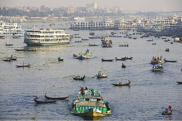 Boat traffic on the Buriganga. The Buriganga or "Old Ganges" is a river in Bangladesh that flows through the southwest outskirts of the capital city, Dhaka; its depth ranges between 7 and 18 m (23 to 59 ft). The Buriganga is economically important as a connection to other parts of Bangladesh, a largely riverine country. When the Mughals made Dhaka their capital in 1610, the banks of the Buriganga were already a prime location for trade. Today, the Buriganga river is afflicted by pollution.