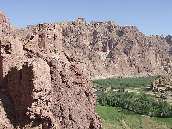 View from Shahr-i-Zohok (the &quot;Red City&quot;) in Bamyan Province. Once a citadel housing about 3,000 people, it was destroyed by the Mongols in the 13th century. The invaders also leveled the nearby city that the fortress had protected and massacred all its inhabitants (possibly 150,000) and animals. In memory, the site is today known as Shahr-i-Gholghola (the &quot;City of Screams&quot;).