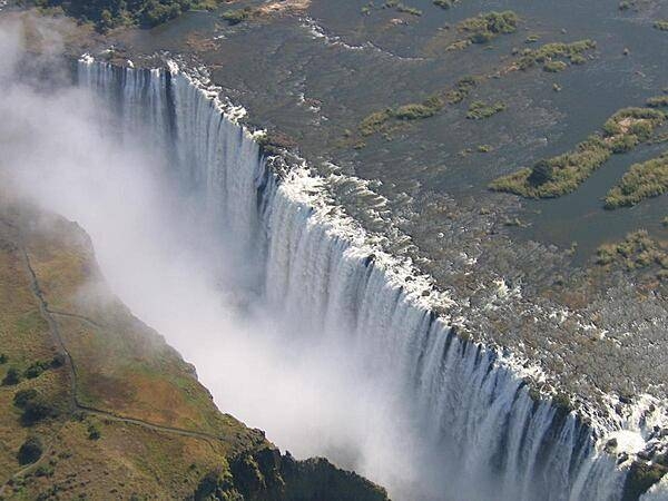 View of Victoria Falls on the Zambezi River as seen from the Zambian (eastern) side.