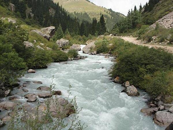 A river outside of Bishkek. Note the milky color as a result of glacial sediments.