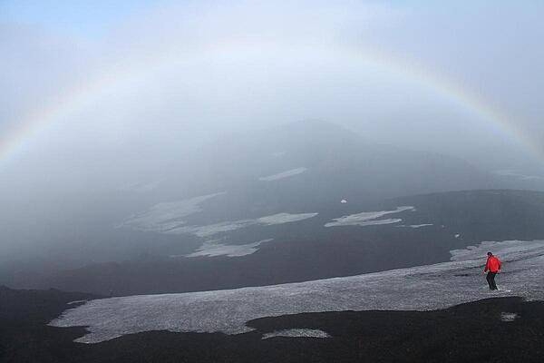 Descent down Hekla across the snowpack. Hekla is a stratovolcano located in the south of Iceland; it is one of the island&apos;s most active volcanoes, having erupted more than 20 times since the ninth century A.D.