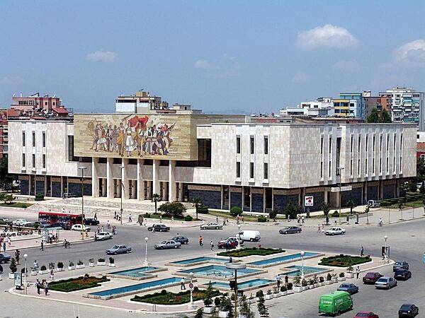 &quot;The Albanians,&quot; a colorful mosaic on the facade of the National Historical Museum in Tirana, depicts the evolution of Albanian history from ancient Illyrians to 20th-century partisans.