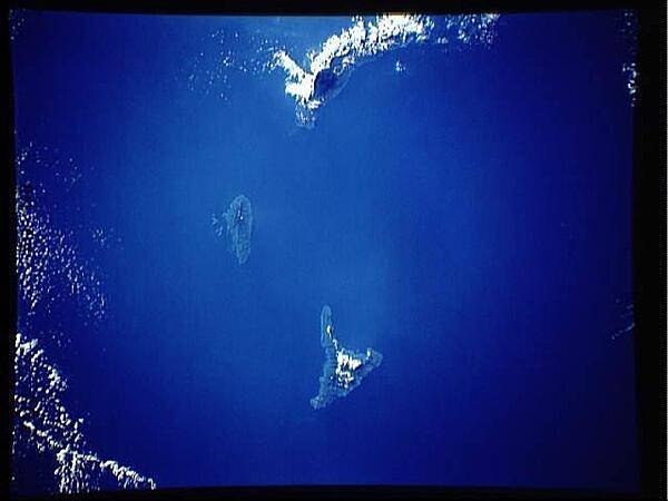 All three main islands of the Comoros archipelago are visible in this satellite image: Grande Comore (top), Moheli (middle), and Anjouan (bottom). Photo courtesy of NASA.