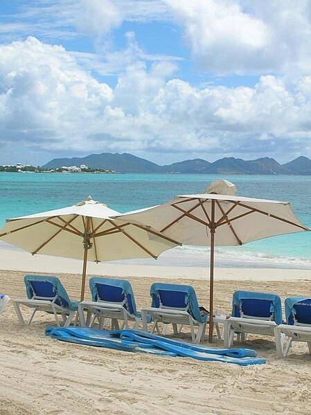 The land mass seen across Rendezvous Bay is the island St. Martin, which is separated from Anguilla by the Anguilla Channel. Rendezvous Bay houses the longest beach in Anguilla and is the site of the Battle of Anguilla (1796). The engagement took place during the Napoleonic Wars; the French were dispatched from St. Martin and landed on the beach of Rendezvous Bay. The invaders destroyed Anguilla&apos;s plantations, which by 1821 had almost entirely disappeared from the island. Although, the French were eventually routed by the British, the island&apos;s plantations never recovered, forcing many Anguillans into maritime occupations.