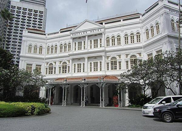 The Raffles Hotel in Singapore was founded in 1887; it was named for Stamford Raffles, the founder of modern Singapore. The Singapore Sling, widely regarded as the national drink, was first created in 1915 by Raffles bartender Ngiam Tong Boon. Primarily a gin-based cocktail, the Singapore Sling also contains pineapple juice, lime juice, Curacao, and Benedictine. At a time when it was considered improper for ladies to consume alcohol in public, the ingenious bartender made the beverage pink with grenadine and cherry liqueur to give it a feminine flair and to resemble fruit juice. The disguise worked, leading people to think it was a socially acceptable drink for women. And so, the Singapore Sling was born.
