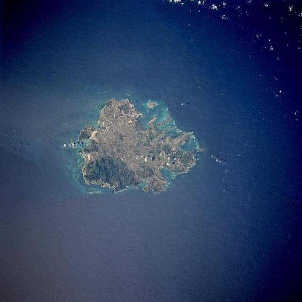 The island of Antigua as seen from space. St. John&apos;s, the country&apos;s capital, is located along the northwest coast, adjacent to one of the island&apos;s many natural harbors. More than half of the country&apos;s population lives in the St. John&apos;s area. Image courtesy of NASA.