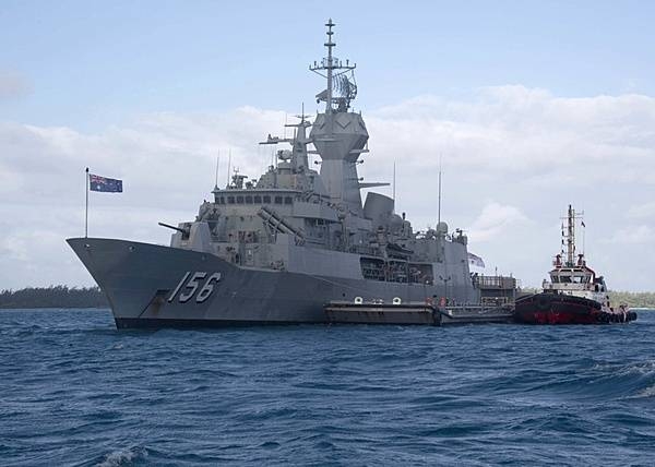 The Australian frigate HMAS Toowoomba makes a port call at Diego Garcia. The lagoon provides a sheltered anchorage for replenishment. Diego Garcia provides critical logistical infrastructure support to US and Allied Forces forward deployed to the Indian Ocean and Arabian Gulf. Photo courtesy of the US Navy.