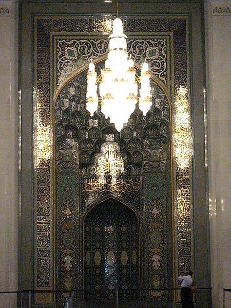 The 70 x 60 m (230 x 197 ft) prayer carpet in the main prayer hall of the Grand Mosque in Muscat is the second largest hand-woven, single-piece carpet in the world and took four years to complete. The primary chandelier, a smaller version of which is shown in this photo, is 14 m (46 ft) tall.