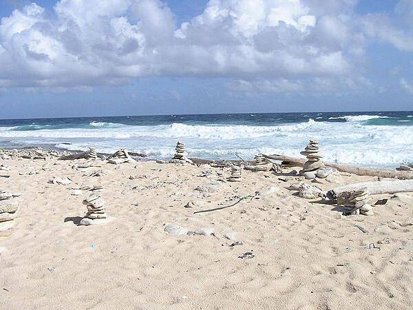 Rock figurines on a beach along the east shore.