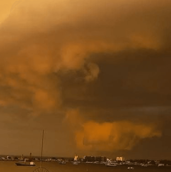 Massive storm clouds gather over Luanda.