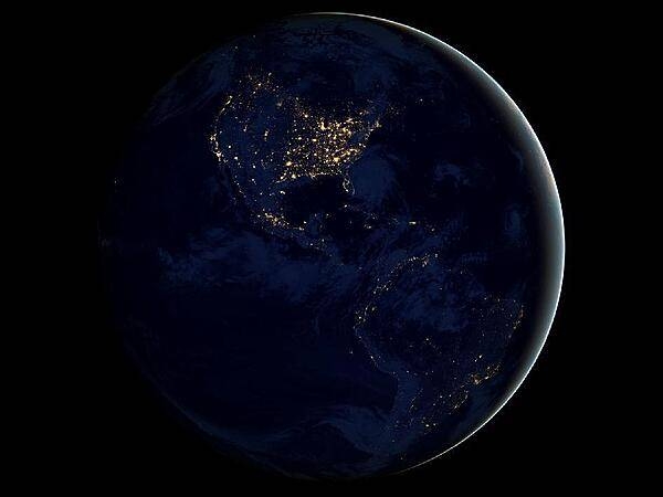 This global view of city lights in the Western Hemisphere is a composite assembled from satellite data acquired over nine days in April 2012 and 13 days in October 2012. It took 312 orbits to get a clear shot of every parcel of Earth's land surface and islands. This new data was then mapped over existing Blue Marble imagery of Earth to provide a realistic view of the planet. Image courtesy of NASA.