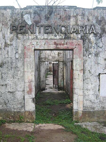 The ruins of a jungle prison on the island of Coiba in Panama. The entire island was once a penal colony, but is now a nature reserve. The last few prisoners, who have no other home, tend the ruins of the main prison grounds.