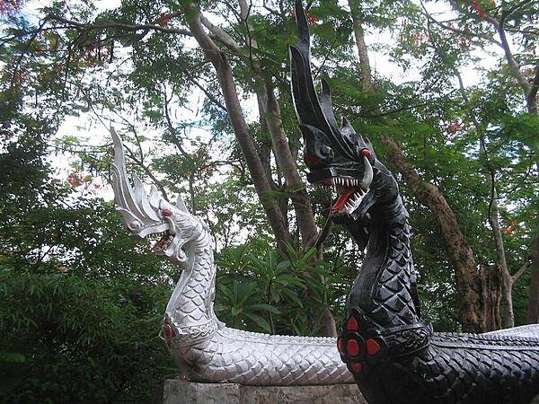 Nagas (serpent deities) adorn the staircase on the west side of Phou Si in the center of Louangphrabang, the former royal capital of Laos.