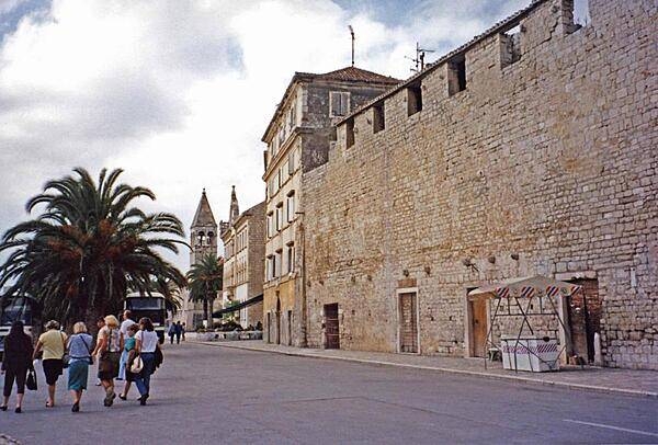 Outside the walls of historic Trogir. The town&apos;s 2,300 years of continuous urban tradition (Greek, Roman, Venetian, Habsburg) have left a fascinating and unique concentration of palaces, churches, towers, and fortifications. In 1997, Trogir was inscribed onto the UNESCO list of World Heritage Sites.