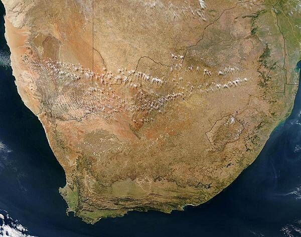 Satellite view of southern Africa. The bulk of image is taken up by the Republic of South Africa. Within South Africa is the roughly circular enclave of Lesotho. Northeast of Lesotho is the smaller country of Eswatini (formerly known as Swaziland). Photo courtesy of NASA.