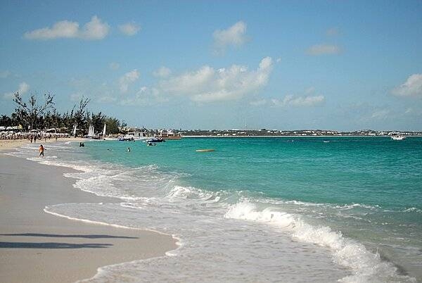 View of a wide sandy beach on Providenciales Island.