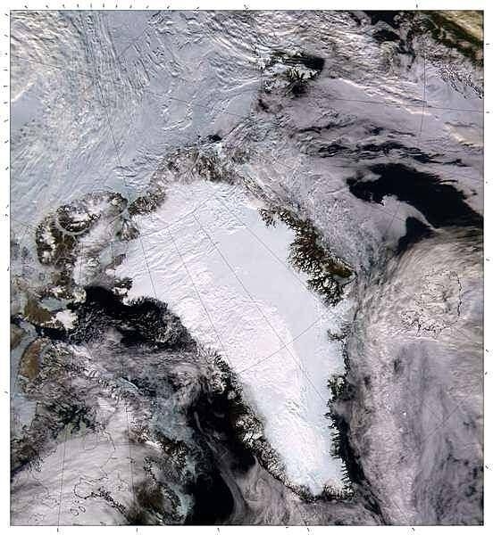 A view of the northern part of the world showing all of glacier-topped Greenland cloud free. The point in the upper left where the longitude lines converge over the ice-clogged Arctic Ocean is the North Pole. The islands in the upper center are those of Svalbard. Image courtesy of NASA.