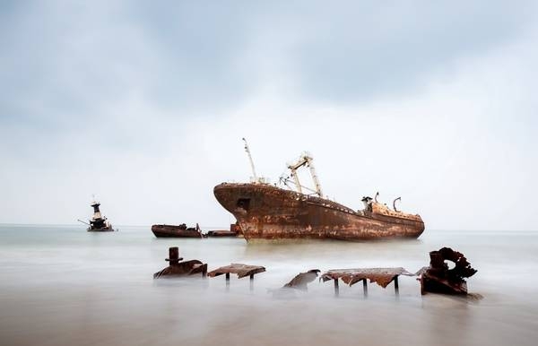 Located some 30 km north of Luanda, Angola's capital, is 2.5 km-long Shipwreck Beach. The area acquired its name when in the 1970’s disused ships of bankrupt companies were towed to this remote beach forming a ship graveyard. The ships date back to the 1960’s with the largest of the over 20 rusting hulks being an oil tanker named "Karl Marx."