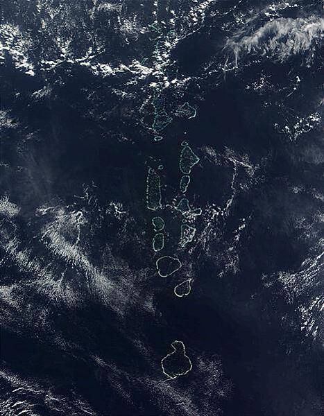 All but the southernmost of the Maldives many atolls, Addu Atoll, is visible in this 2006 space-based image. Photo courtesy of NASA.